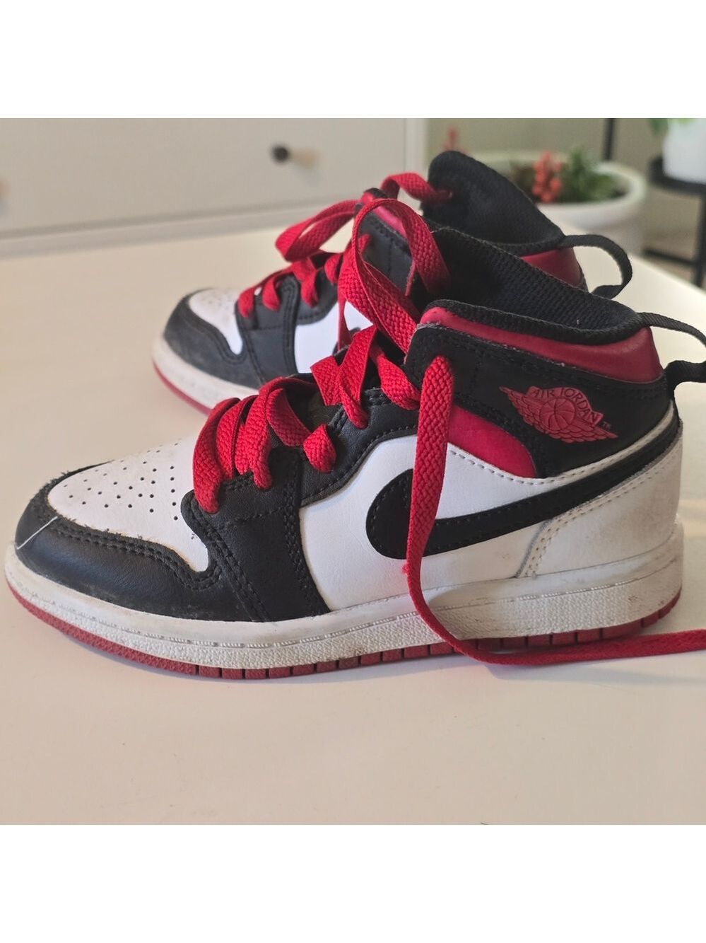 Nike Air Jordan  Kids Black and White Sneakers with Red Laces